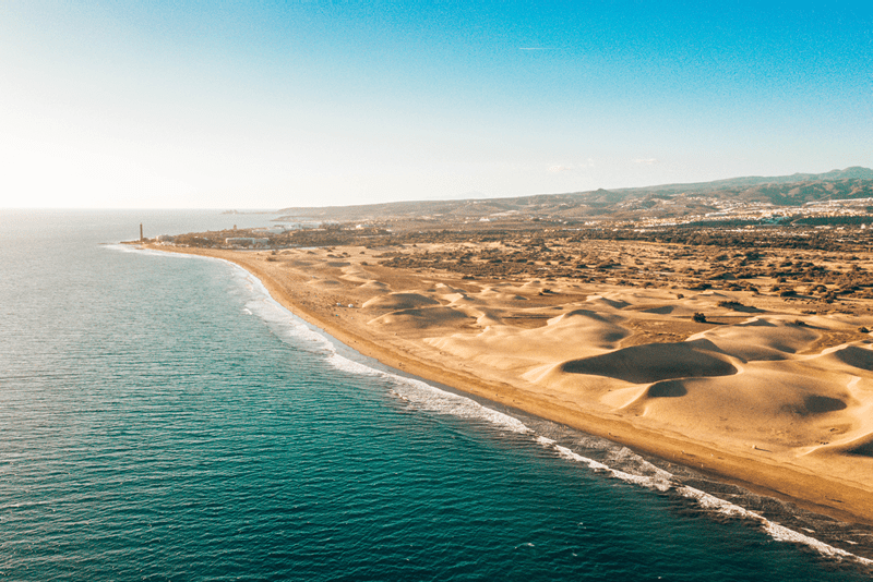 Aerial Maspalomas dunes view on Gran Canaria island near famous RIU hotel.