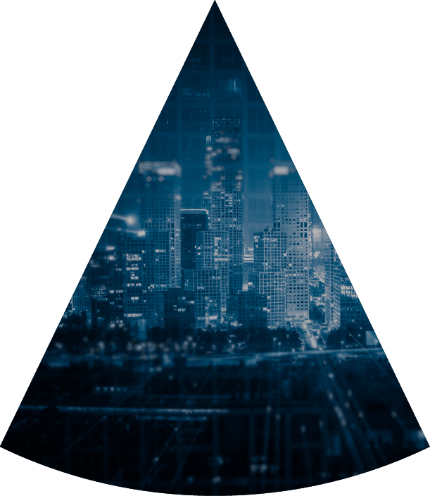 Light trails above buildings at night in China.